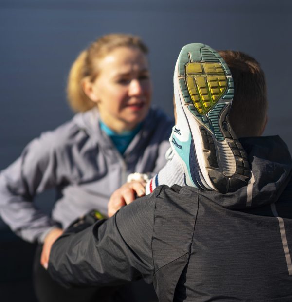 medium shot people working out together